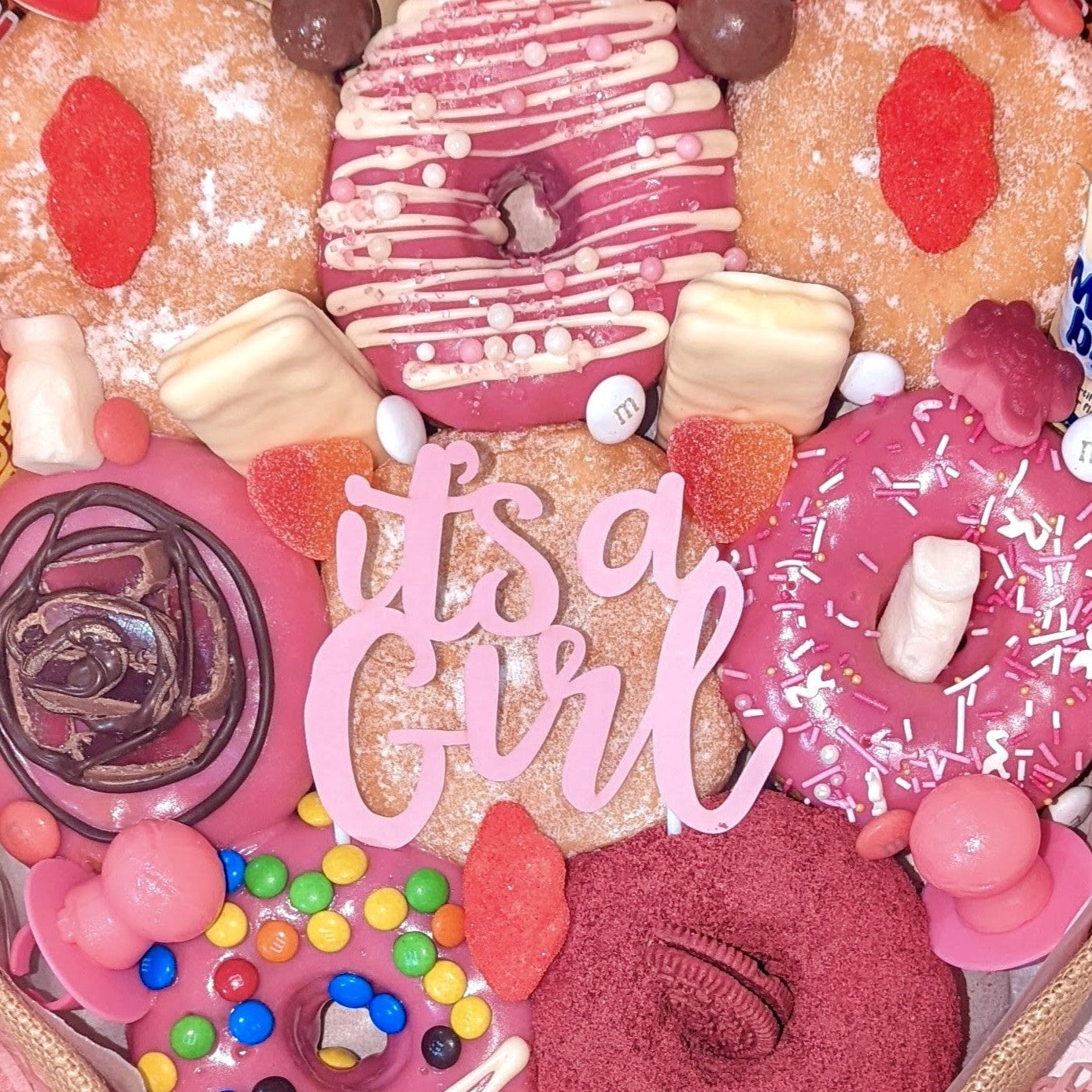 The most delicious new baby gifts are delivered. Our yummy new baby gift boxes will delight new parents with soft donuts and cheeky chocolates. If you are looking for non-baby gifts for new parents Australia, sending a donut bouquet is perfect as a new parents gift basket. It is ideal for christening gifts Australia.