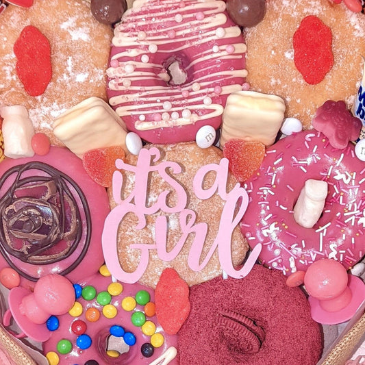 The most delicious new baby gifts are delivered. Our yummy new baby gift boxes will delight new parents with soft donuts and cheeky chocolates. If you are looking for non-baby gifts for new parents Australia, sending a donut bouquet is perfect as a new parents gift basket. It is ideal for christening gifts Australia.