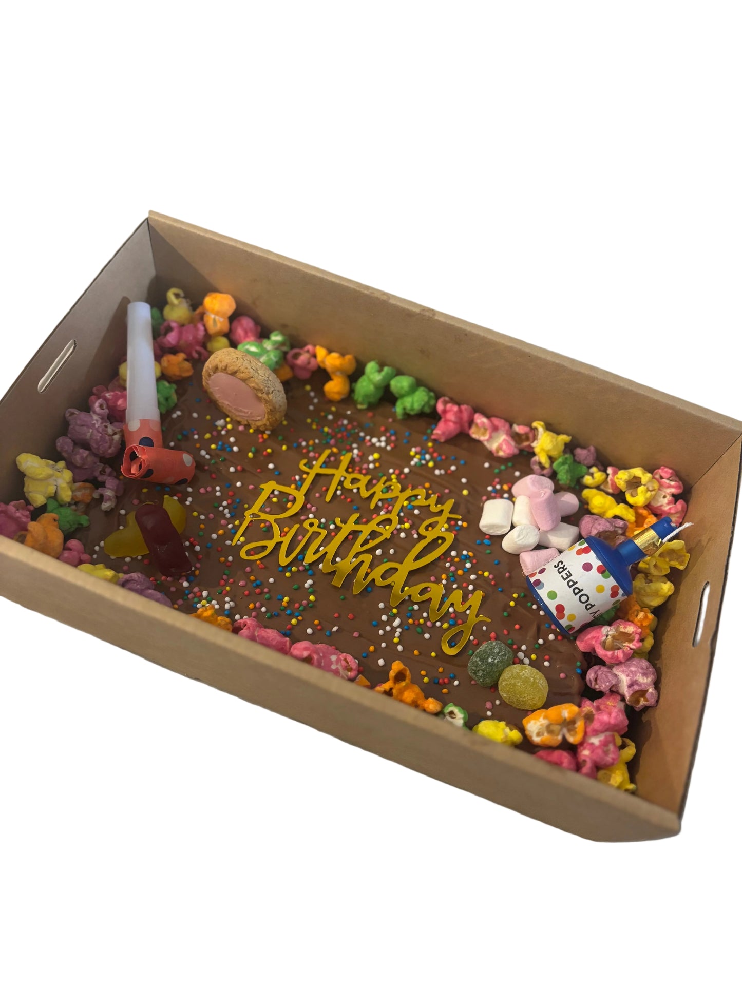Box filled with colorful candy and a 'Happy Birthday' message on a light background
