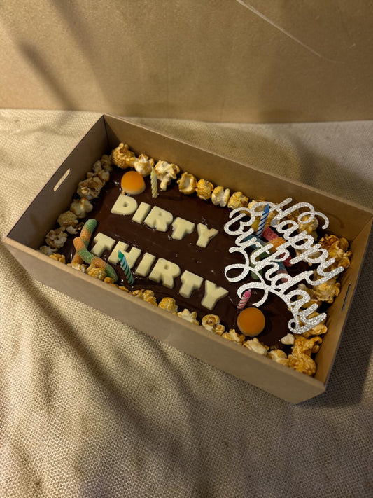 Donut Bouquet Canberra custom brownie block with white chocolate message, popcorn, and lollies in a gift box.