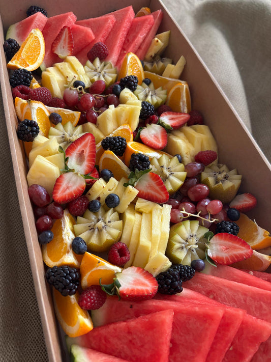 Donut Bouquet Canberra fruit grazing box filled with fresh watermelon, strawberries, blackberries, and grapes and seasonal fruit.