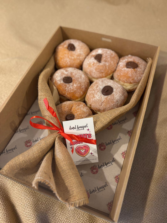 Donut Bouquet Canberra 6 pack Nutella donuts wrapped in rustic hessian with a ribbon in a gift box