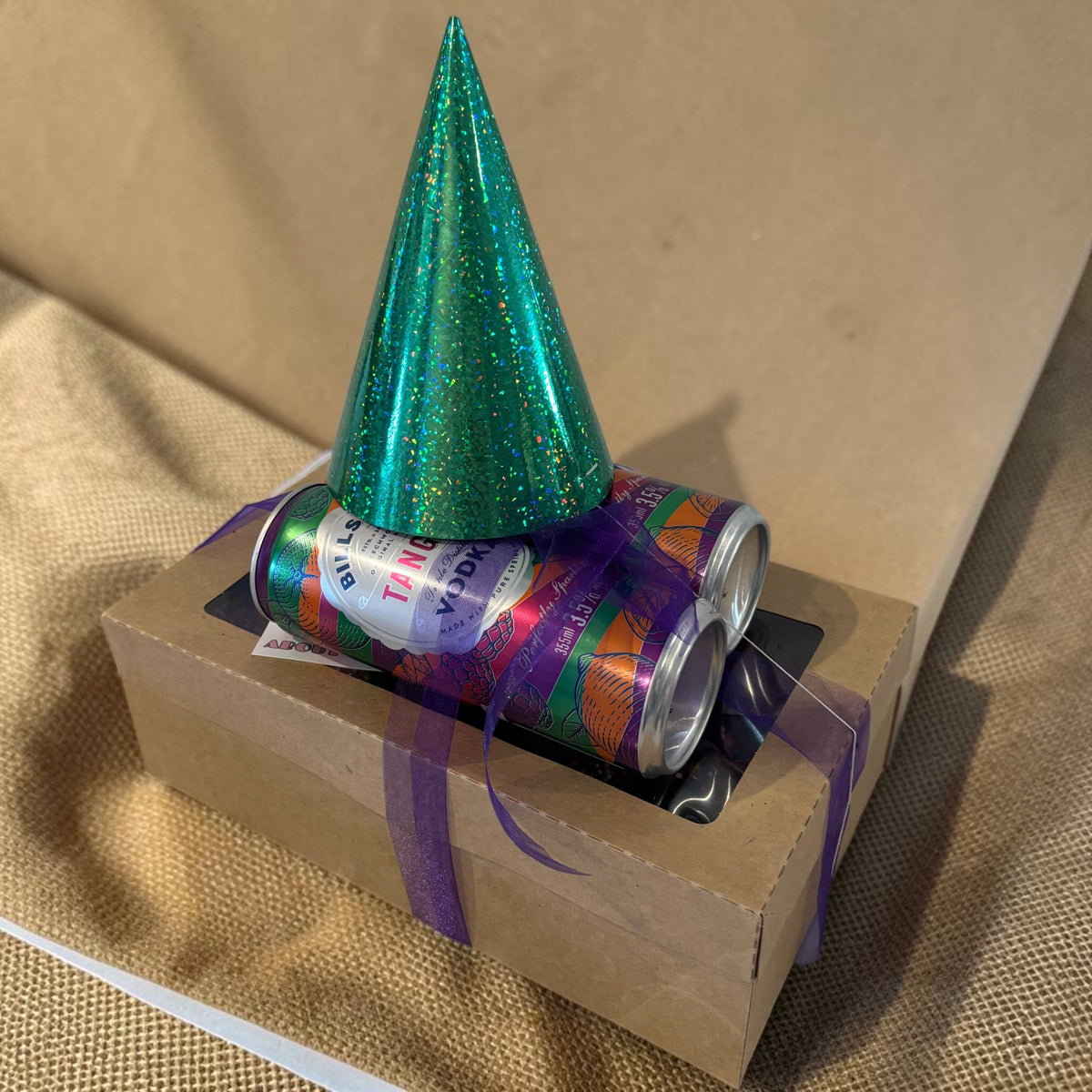 Donut Bouquet Canberra vegan birthday brownie gift box with vodka cans and a green glitter party hat