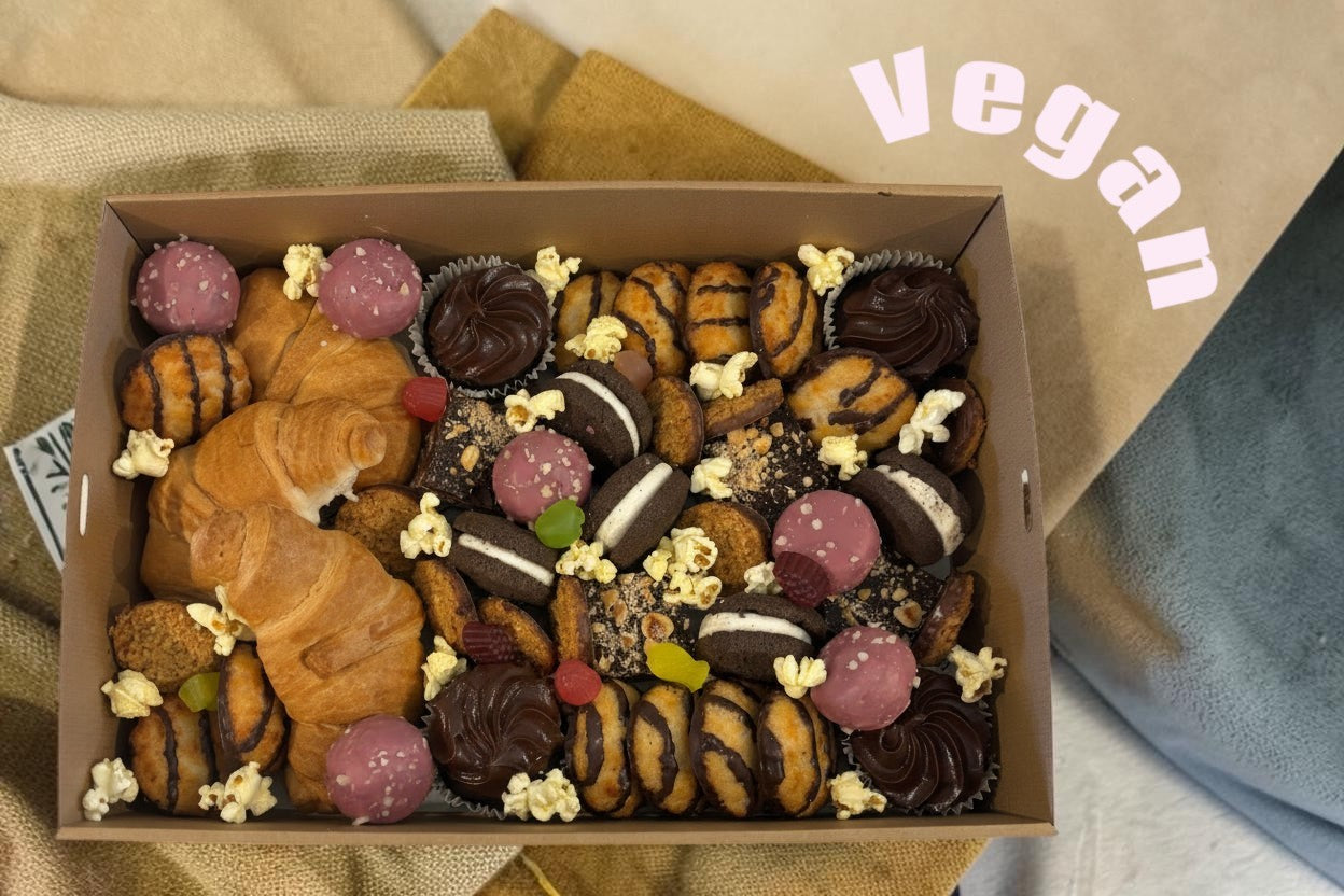 Donut Bouquet Canberra vegan grazing box filled with croissants, cookies, chocolate treats, and popcorn.