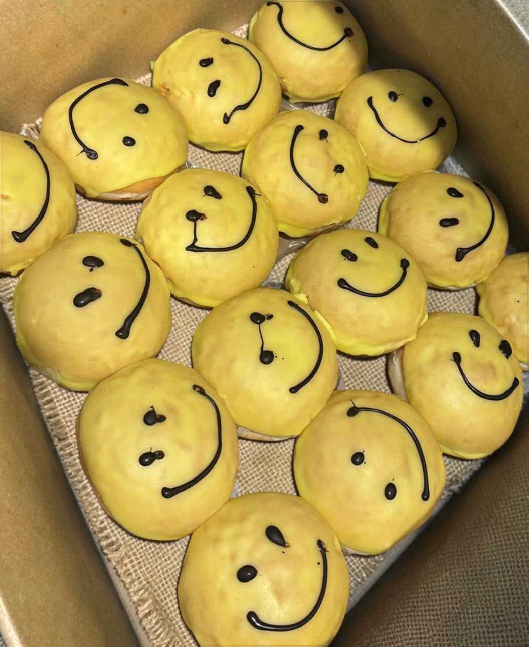 Donut Bouquet Canberra box of yellow smiley face donuts for R U OK Day with chocolate icing smiles